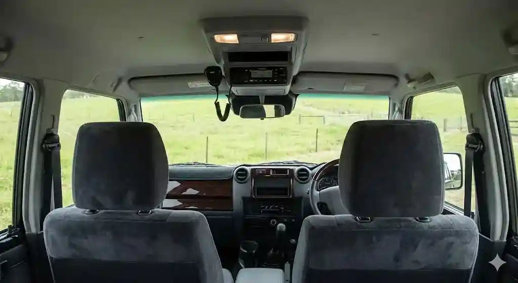 Interior view of 2023 LandCruiser 79 Series Dual Cab with 4WD Interiors roof console installed, showing clearance for AEB camera.