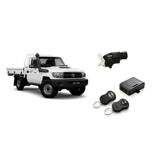 White Toyota truck with car alarm system components on a white background
