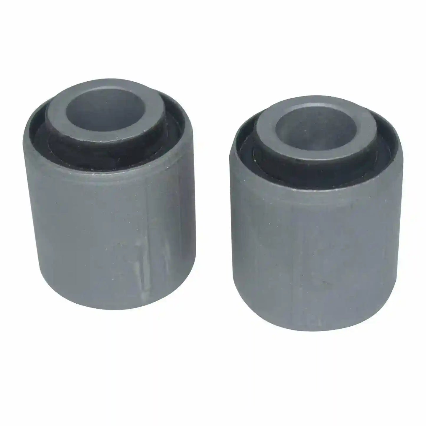 Two gray rubber bushings on a white background