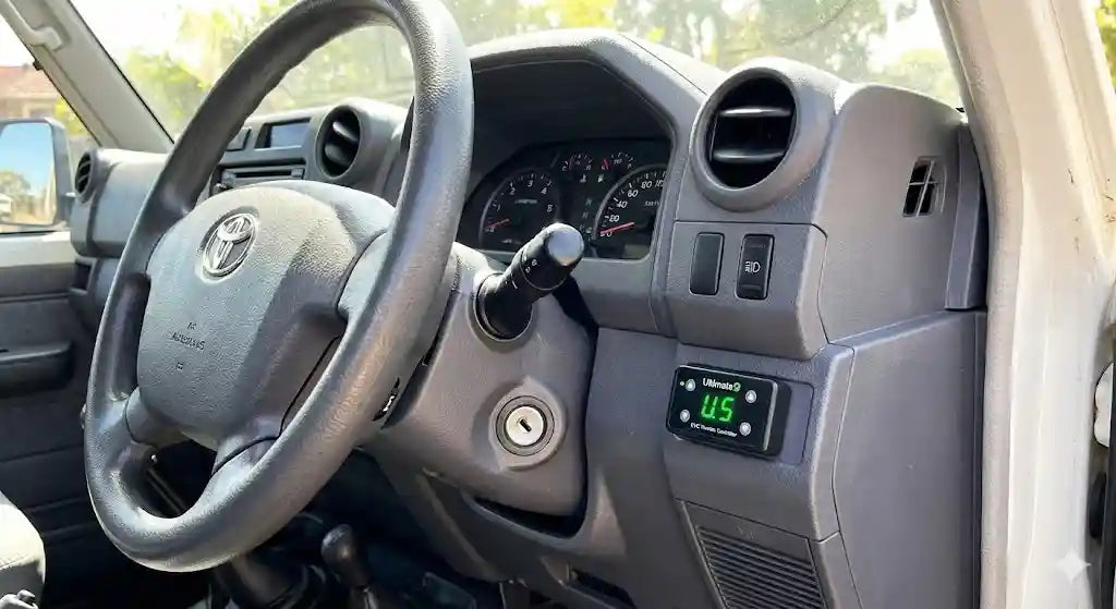 Interior view of Toyota LandCruiser 79 Series (2008 Model) dashboard showing Ultimate9 EVC Throttle Controller.