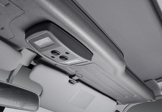 Car interior with a top shelf 