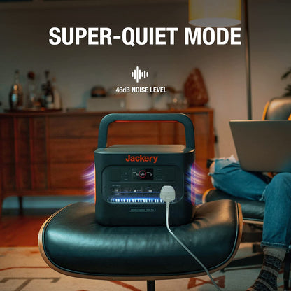 Jackery portable power station with 'Super-Quiet Mode' text in a living room setting.