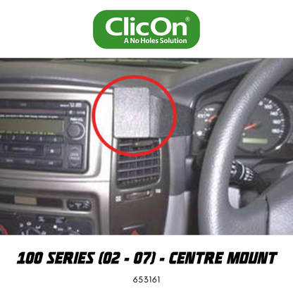 Car dashboard with a ClicOn product mounted, showing '100 Series (02-07) - Centre Mount' text.