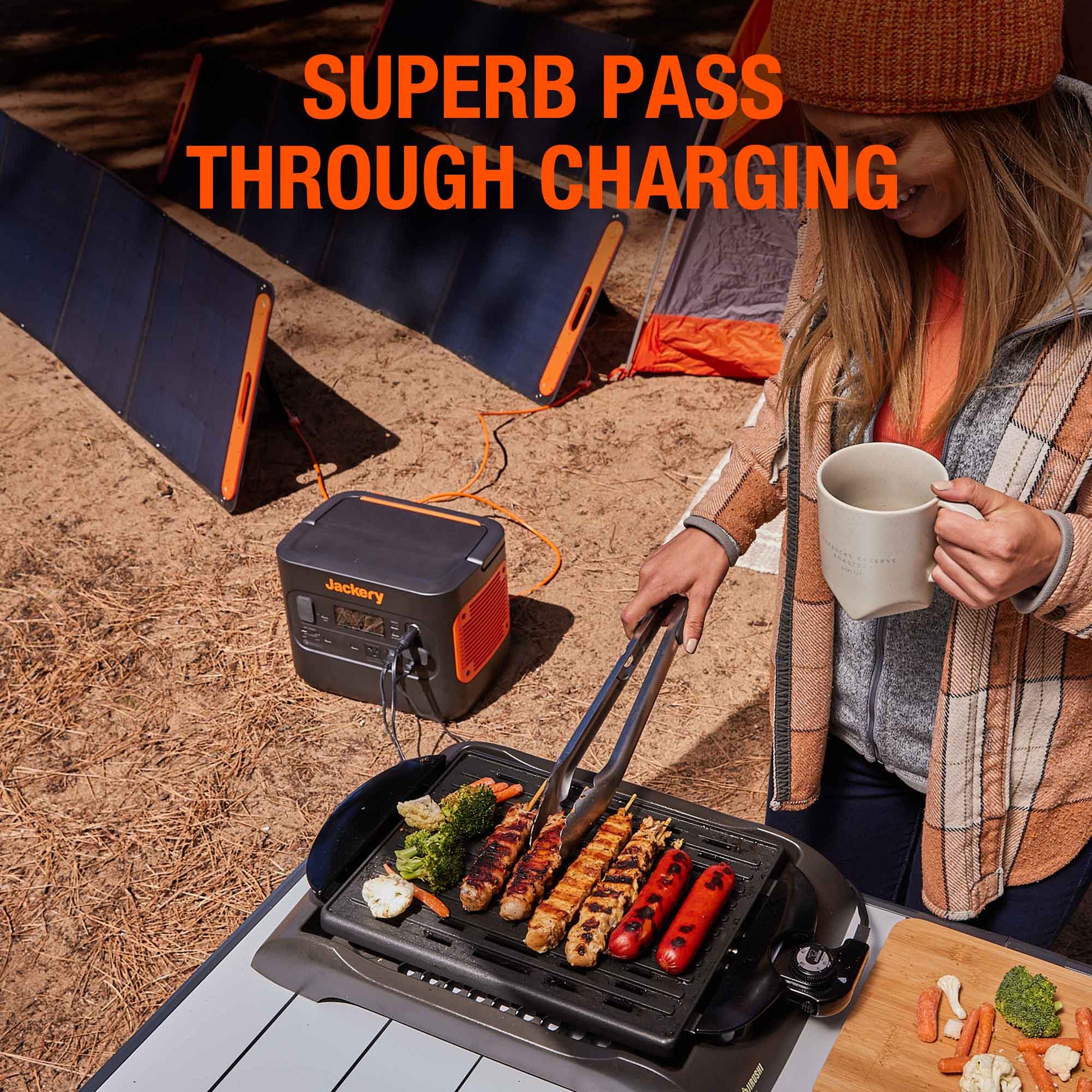 Person grilling outdoors with a Jackery portable power station and solar panel in the background.