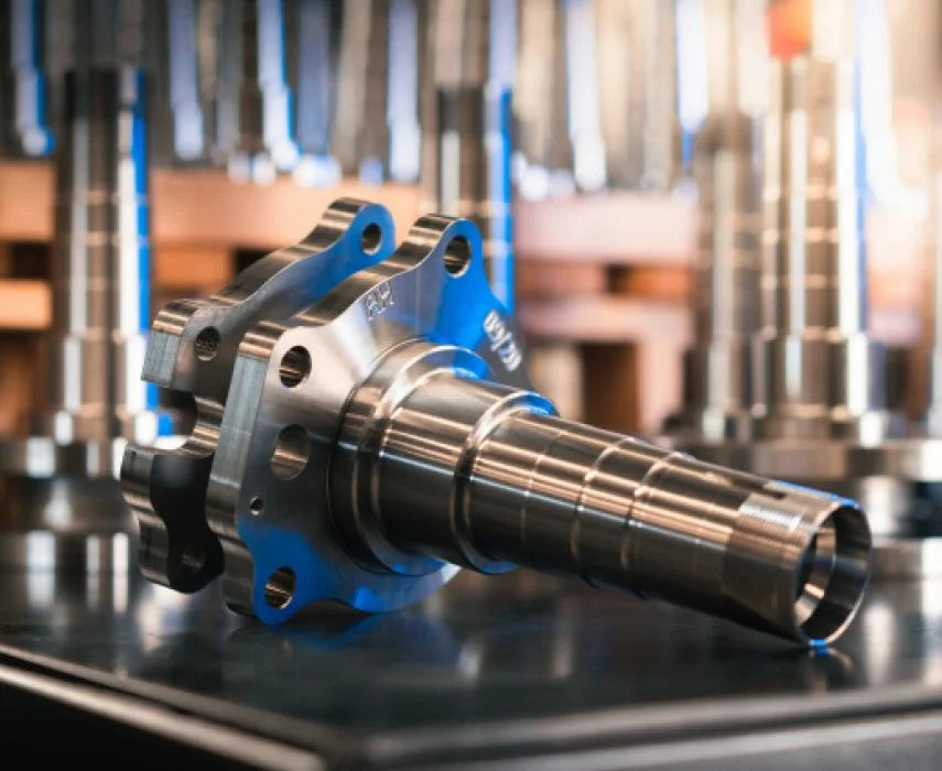 Rear Diff Tru Tracker on a reflective surface with blurred background