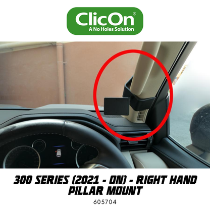 Car mount attached to a vehicle's right hand pillar with ClicOn branding.