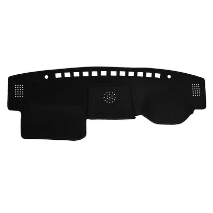 Black car dashboard mat with cutouts on a white background