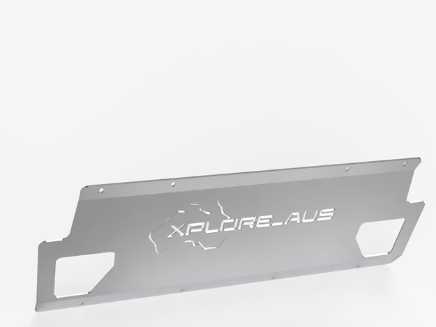 Metallic plate with 'Xplore LAUS' branding on a white background