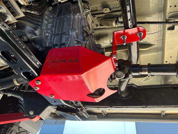 Red undercarriage protection guard on a vehicle with 'Voyage' branding.