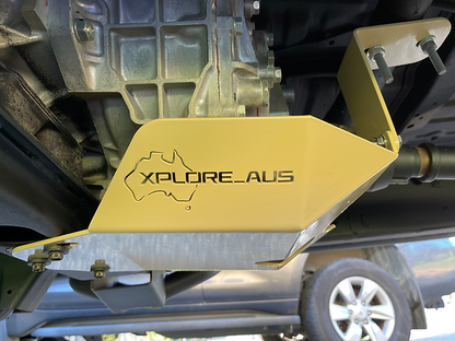 Yellow undercarriage guard with 'Xplore Aus' branding on a vehicle.