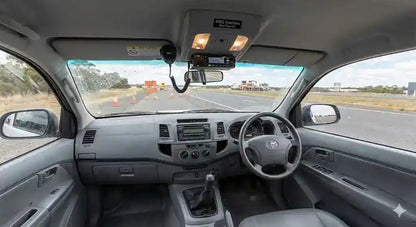 Interior view of Toyota Hilux N80 Single Cab Workmate with 4WD Interiors roof console installed.