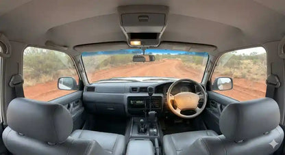 Interior view of 1996 LandCruiser 80 Series Standard (New Dash) with 4WD Interiors roof console.