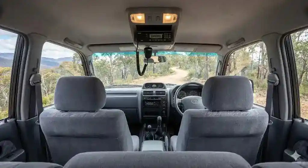 Interior view of 1999 Toyota Prado 95 Series with 4WD Interiors roof console installed.