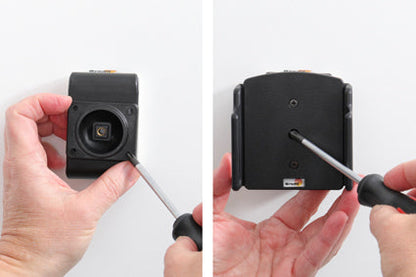 Person using a screwdriver on a Phone Holder