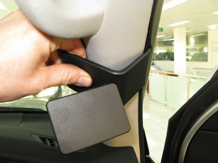 Hand holding ClicOn mount