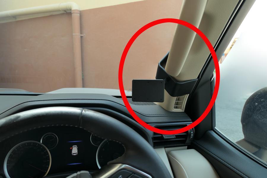 Car interior with a red circle around a ClicOn Dash Mount 