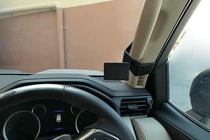 Car interior with a ClicOn Dash Mount on the dashboard.