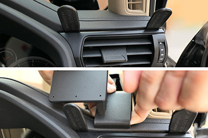 Car phone holder installation process with close-up of holder and hand.