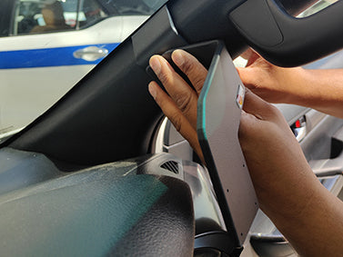 Person installing ClicOn Dash Mount