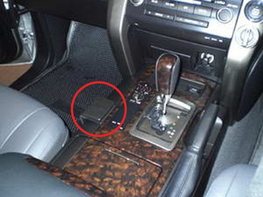 Car interior with a gear shift and surrounding area, ClicOn mount