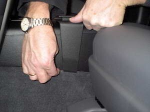 Person installing ClicOn console mount