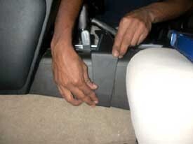 Person adjusting a ClicOn Dash Mount