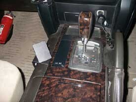 Car interior with gear shift and dashboard view