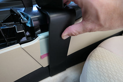 Hand installing ClicOn Dash Mount 