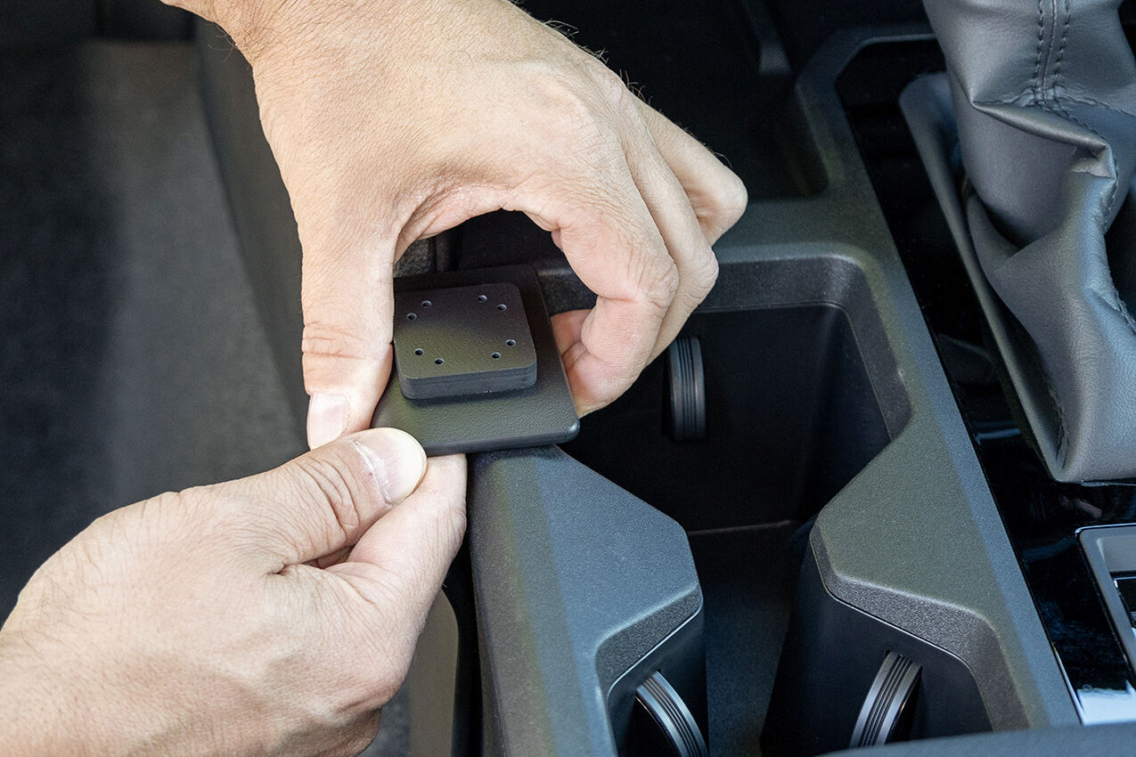 Person installing ClicOn Dash Mount