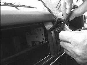 Person using a tool to install ClicOn Dash Mount