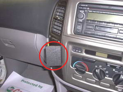 Car dashboard with a red circle around a Dash Mount