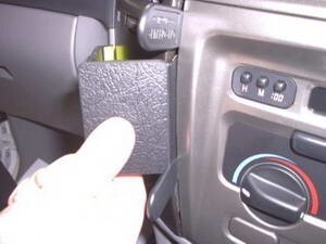 Hand holding a Dash Mount