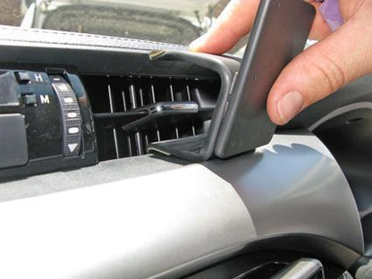 Person installing ClicOn Dash Mount