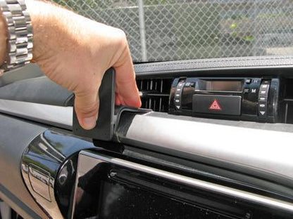 Hand installing ClicOn Dash Mount