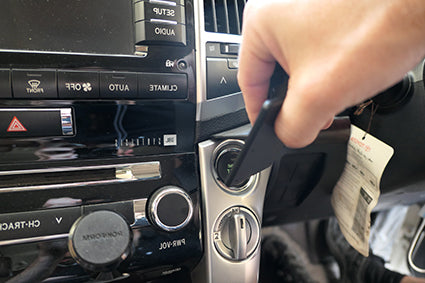 Hand installing a ClicOn Dash Mount