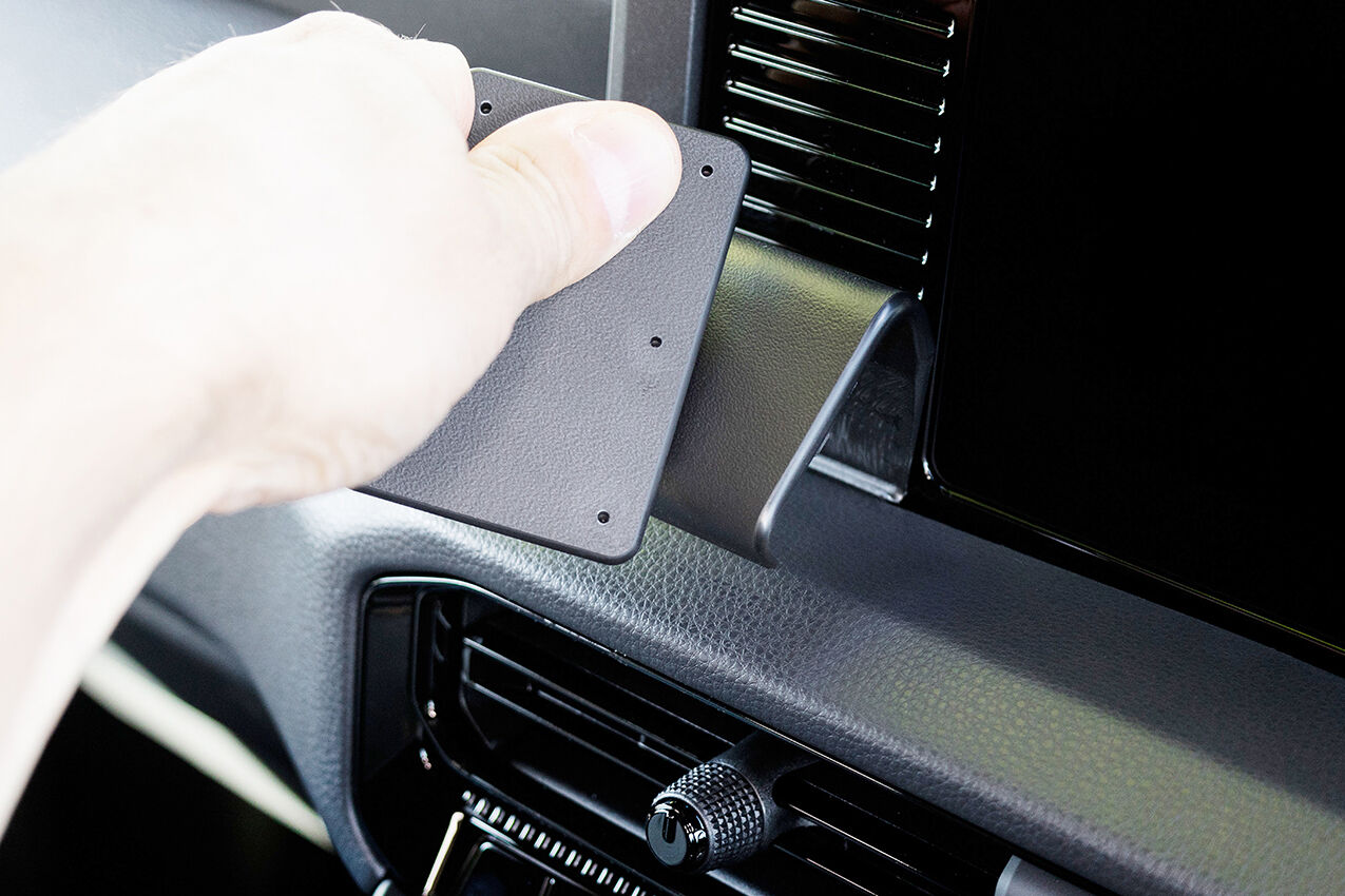 Hand installing a ClicOn Dash Mount