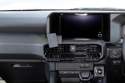 Car interior with a touchscreen display and ClicOn Dash Mount