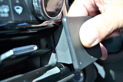 Person adjusting ClicOn Dash Mount