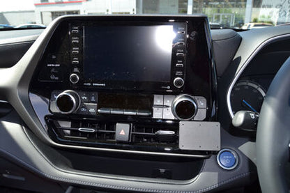 Car dashboard with infotainment system and ClicOn Dash Mount