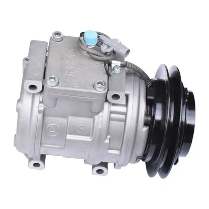 Automotive air conditioning compressor on a white background