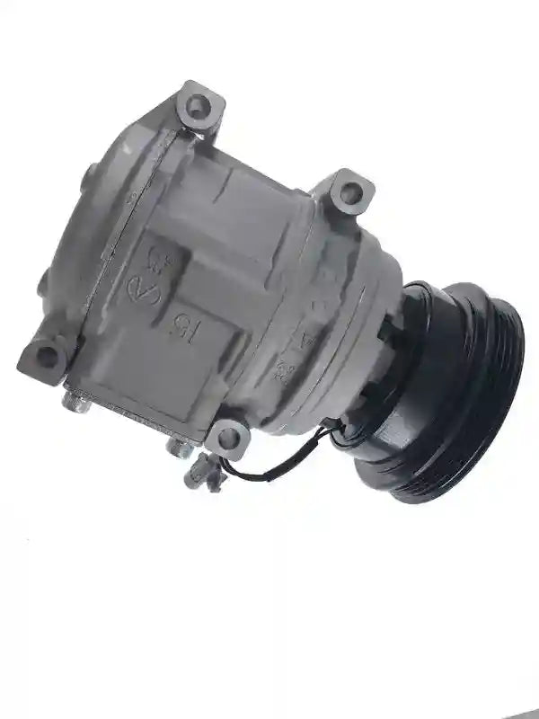 Toyota's AC compressor on a white background