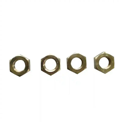 Four brass hex nuts on a white background