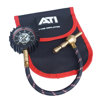 ATI tyre deflator with pressure gauge and nozzle on a white background