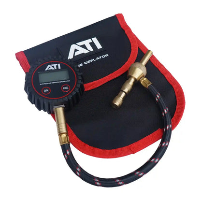 ATI digital tire inflator with red and black cover on a white background