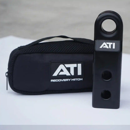 ATI recovery hitch and carrying case on a light gray background