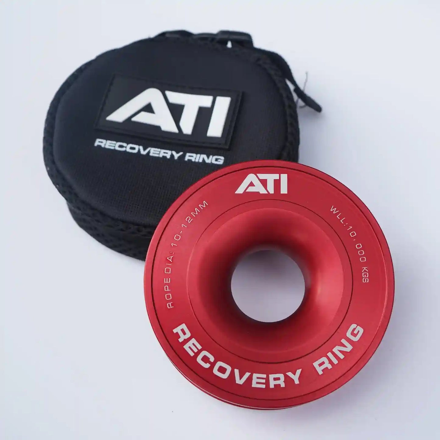 Red ATI recovery ring with black pouch on a white background