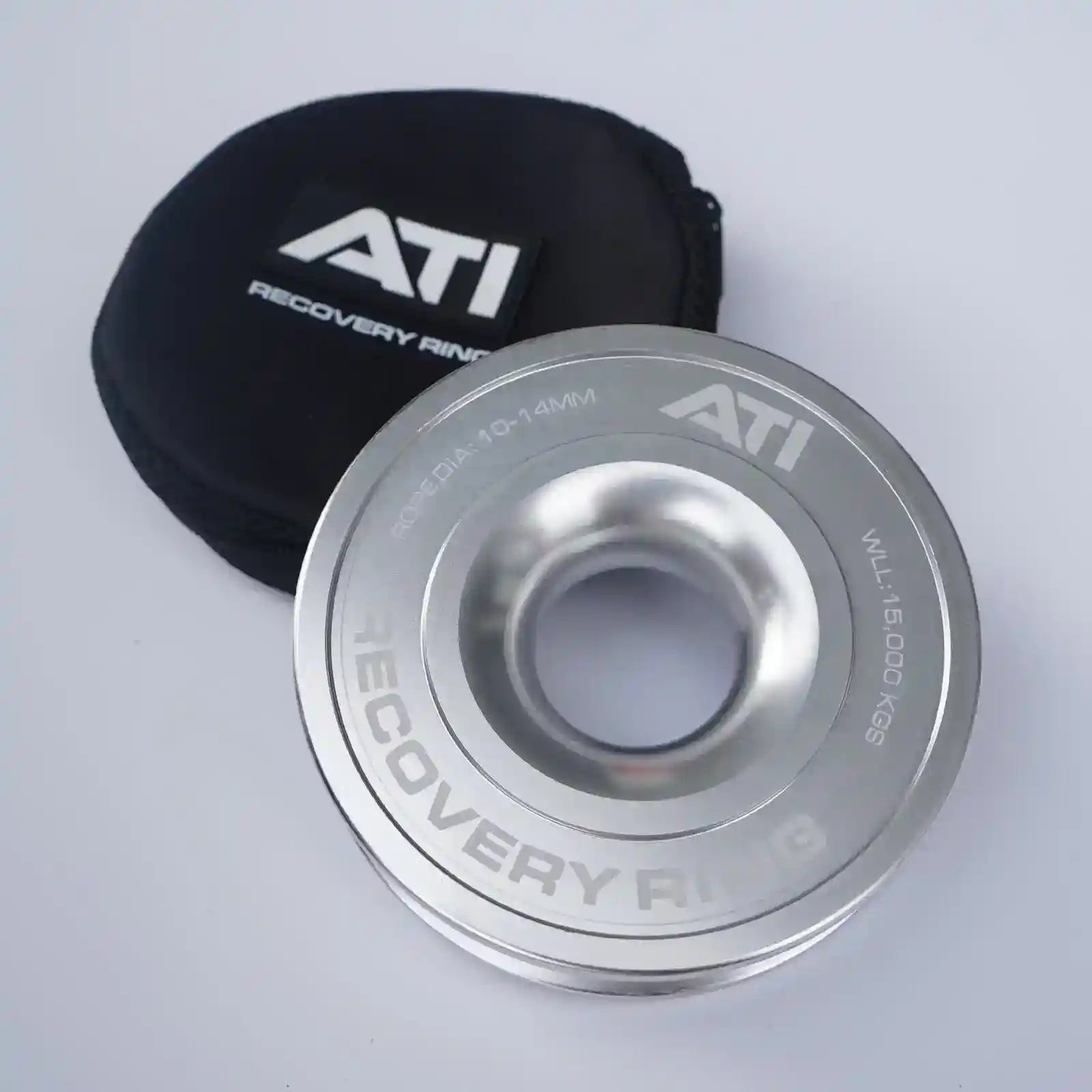 Silver ATI Recovery Ring with black pouch on a light gray background