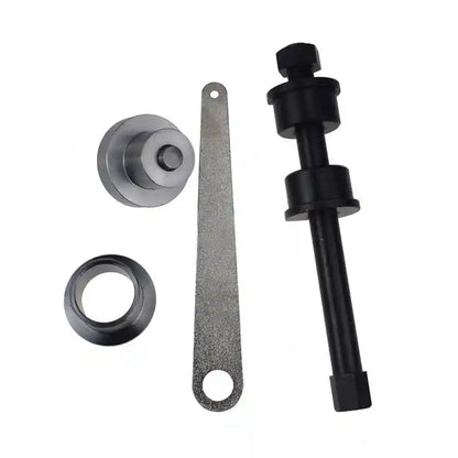 Set of mechanical components including a Steering Knuckle Alignment Tool, gray gear, and other parts on a white background
