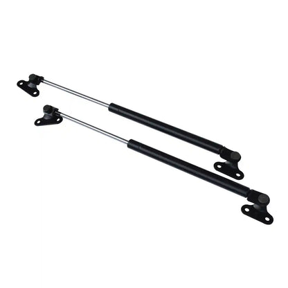 Two black metal Tailgate Struts on a white background