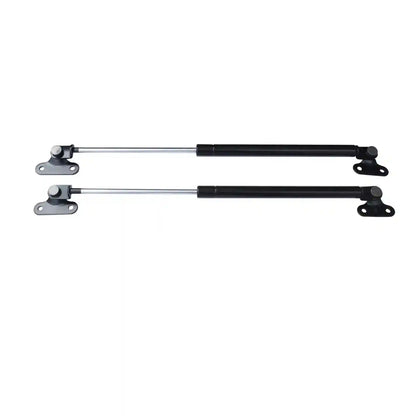 Two black metal Tailgate Struts on a white background